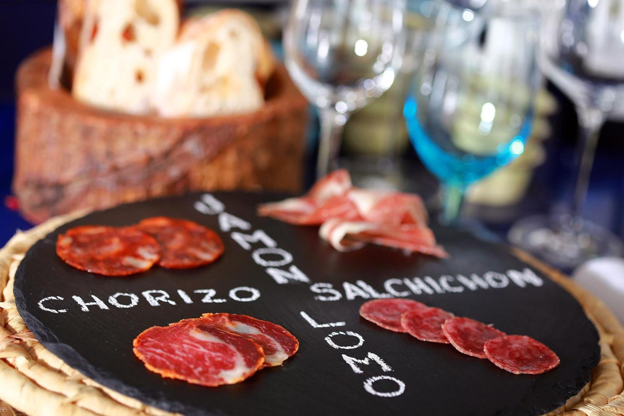 Centara Grand At Centralworld Bangkok Exterior photo A selection of cured meats