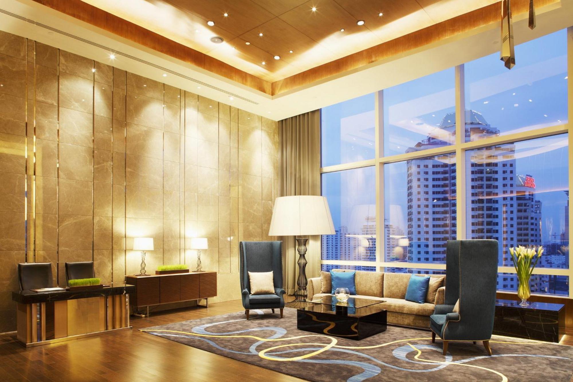 Centara Grand At Centralworld Bangkok Exterior photo The living room of a typical suite